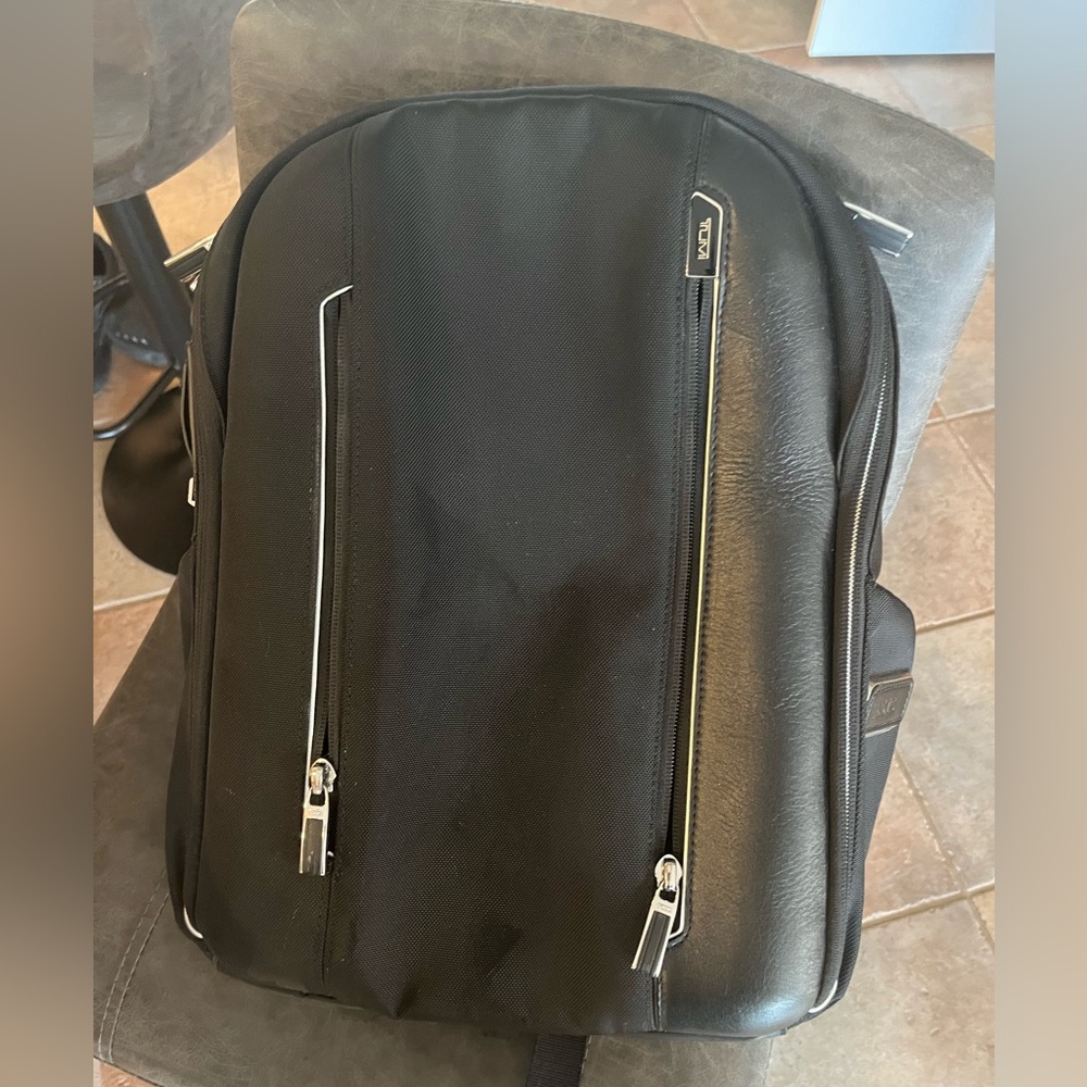 Tumi Arrive Logan backpack in perfect condition
